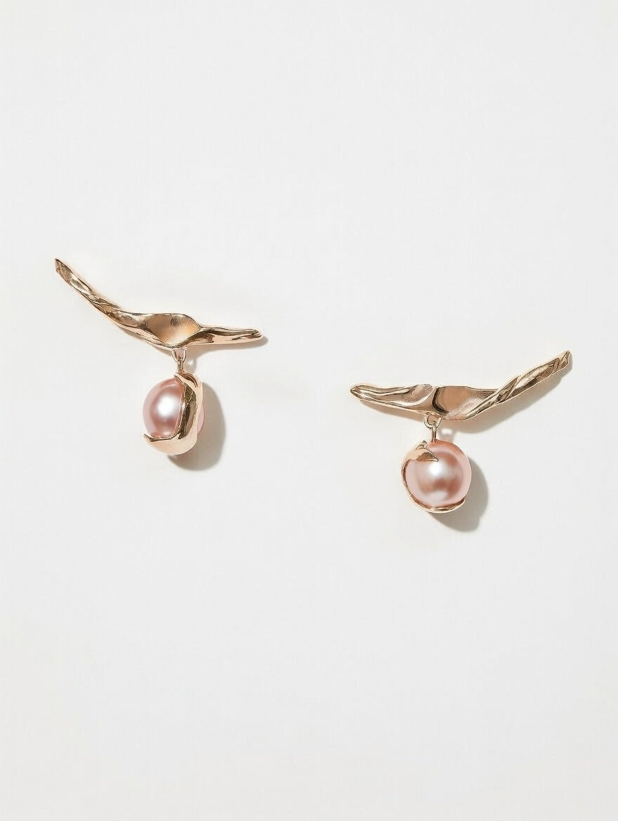 14k rose gold earrings with dangling pink Akoya pearls