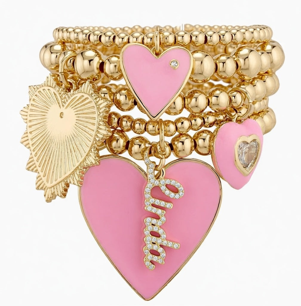 16k gold bracelets with pink enamel heart charms and white diamond accents