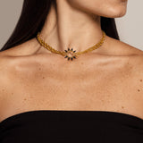 Woman with solid yellow gold choker necklace with edgy spike pendant, plated with Rhodium