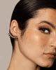 solid gold cuff earring with edgy spikes that are plated Rhodium