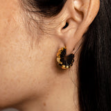 Solid yellow gold earrings with edgy spikes that form a circle